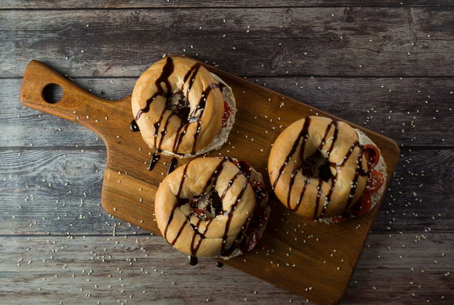 Food photography: seeded bagels on a chopping board